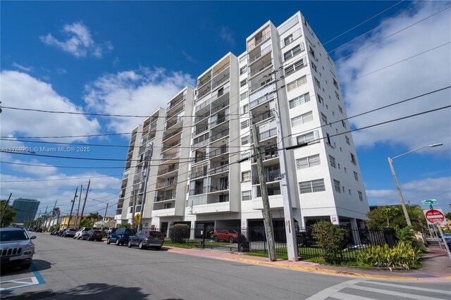 7850 Byron Ave Unit 207, Miami Beach, FL 33141 - view of apartment building / complex with fence