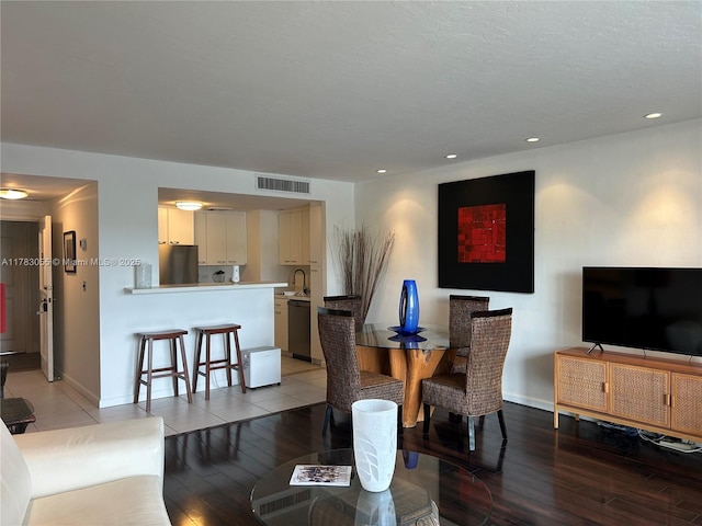 2451 Brickell Ave Unit 4P, Miami, FL 33129 - living room with light wood finished floors, recessed lighting, and baseboards