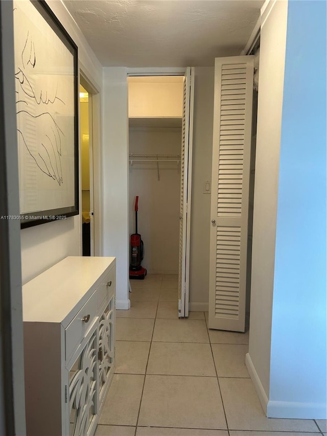 2451 Brickell Ave Unit 4P, Miami, FL 33129 - bathroom with tile patterned flooring and baseboards
