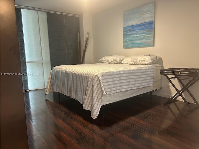 2451 Brickell Ave Unit 4P, Miami, FL 33129 - bedroom with hardwood / wood-style flooring
