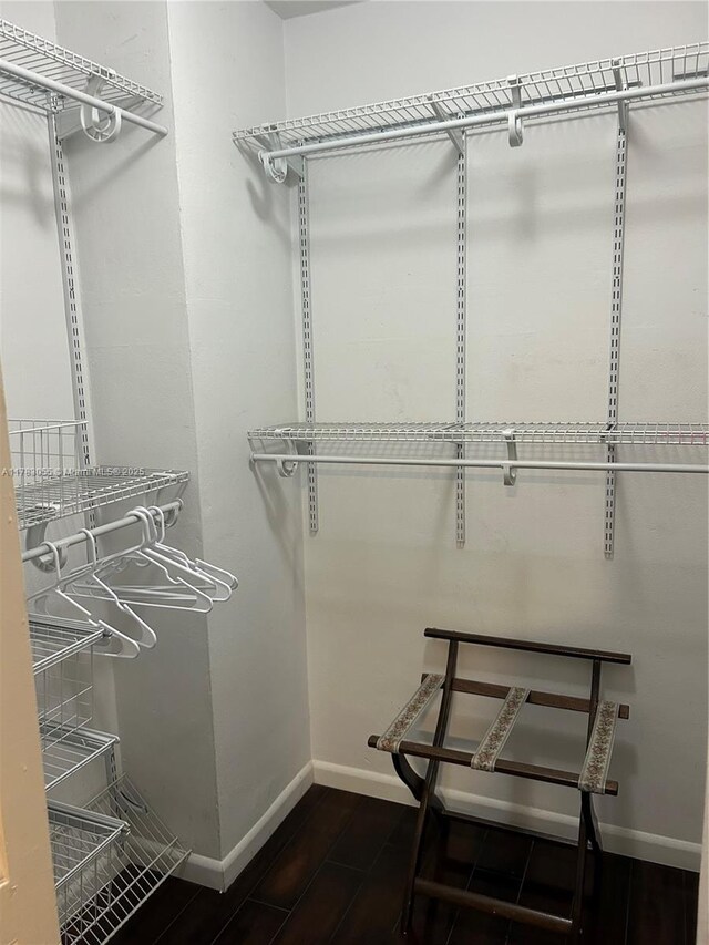 2451 Brickell Ave Unit 4P, Miami, FL 33129 - spacious closet with dark wood-style flooring