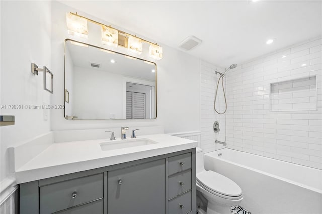 full bath featuring recessed lighting, vanity, shower / bathing tub combination, toilet, and visible vents