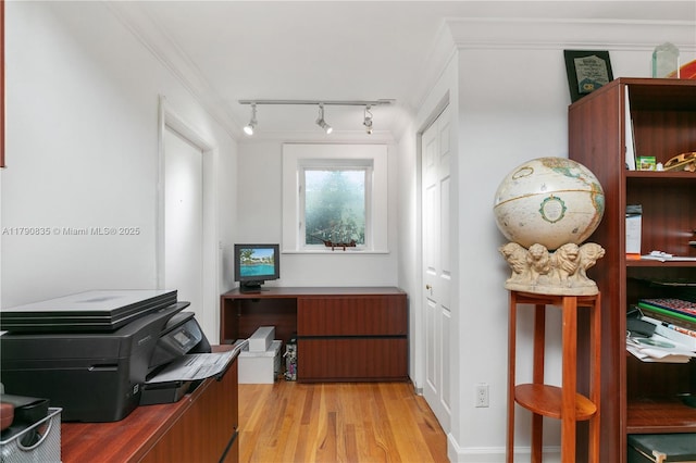 office area featuring crown molding, track lighting, and wood finished floors
