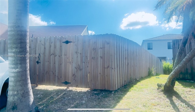 view of yard featuring fence