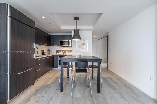 45 SW 9th St Unit 1205, Miami, FL 33130 - dining room with light wood finished floors, a raised ceiling, and recessed lighting
