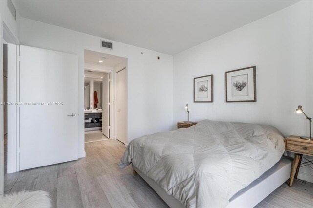 45 SW 9th St Unit 1205, Miami, FL 33130 - bedroom with light wood finished floors