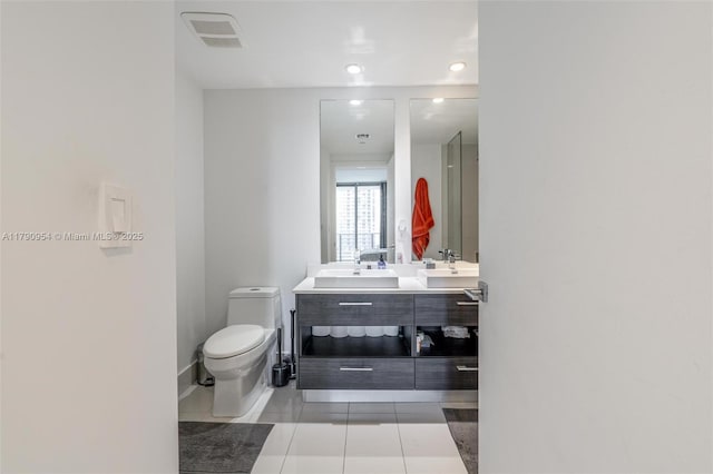 45 SW 9th St Unit 1205, Miami, FL 33130 - bathroom with tile patterned flooring, double vanity, and recessed lighting