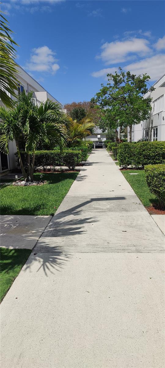 view of street featuring driveway
