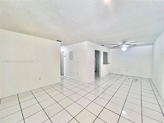 12955 SW 66th Ln Unit 214-2, Miami, FL 33183 - empty room featuring ceiling fan, light tile patterned floors, and a textured ceiling