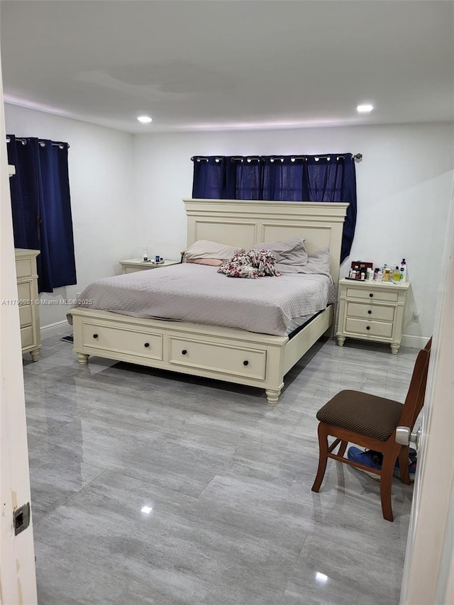bedroom with recessed lighting