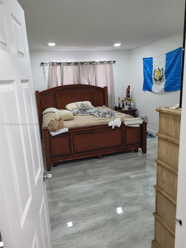 bedroom featuring recessed lighting