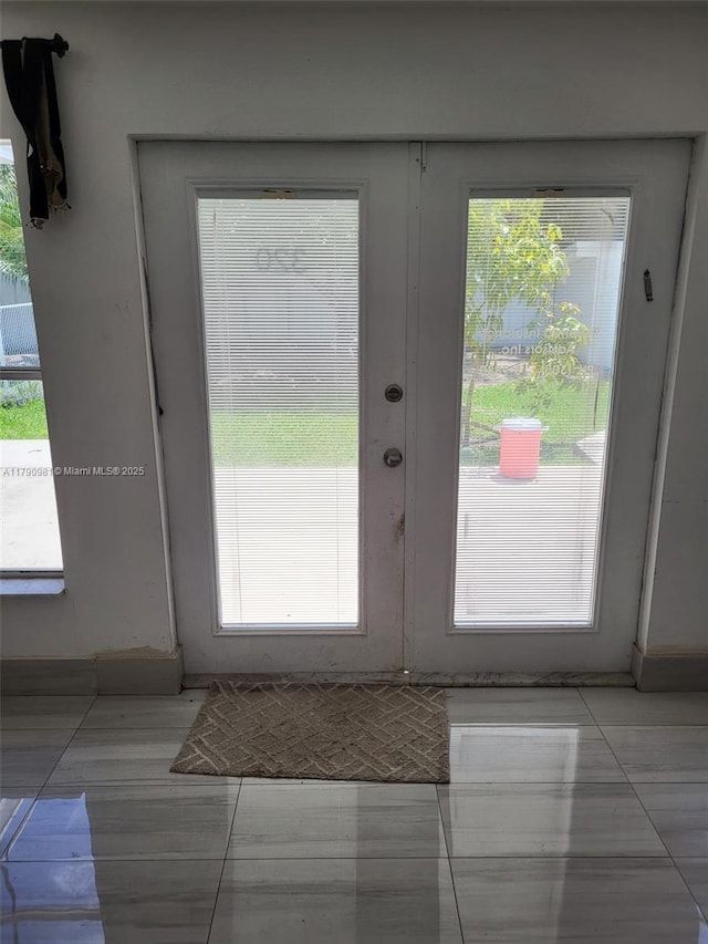 doorway to outside with a wealth of natural light