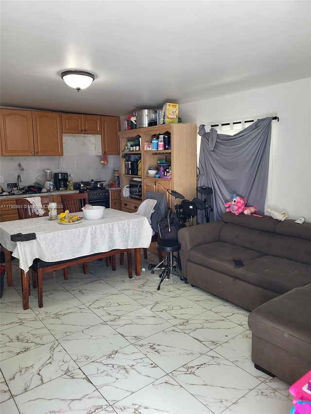 dining space with marble finish floor