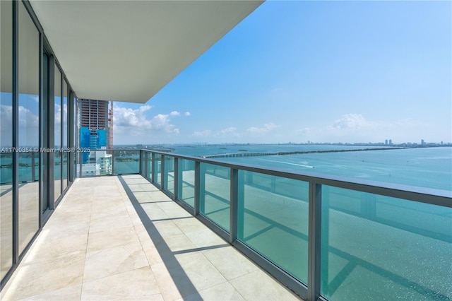 balcony featuring a water view