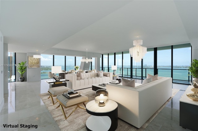 living room with a chandelier, a water view, and expansive windows