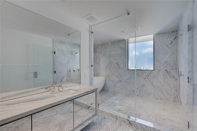 788 NE 23rd St Unit 3102, Miami, FL 33137 - full bathroom featuring a marble finish shower, vanity, and marble look tiles
