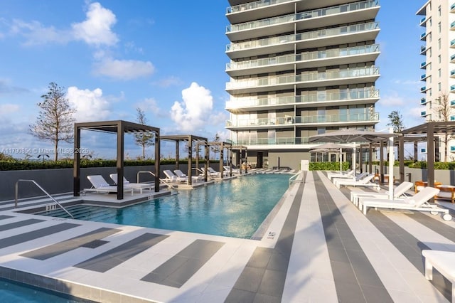 pool with a patio
