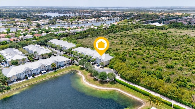 bird's eye view featuring a residential view and a water view