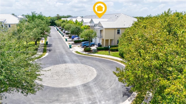 view of street with a residential view and sidewalks