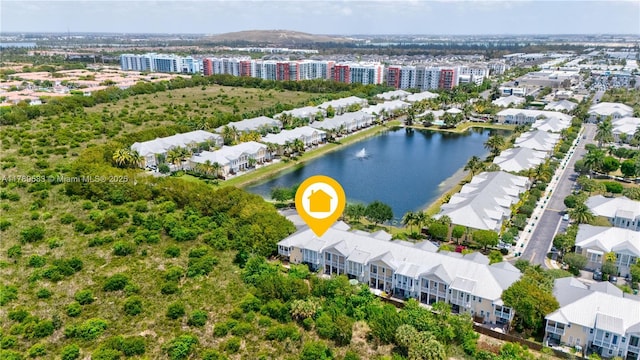 drone / aerial view featuring a water view