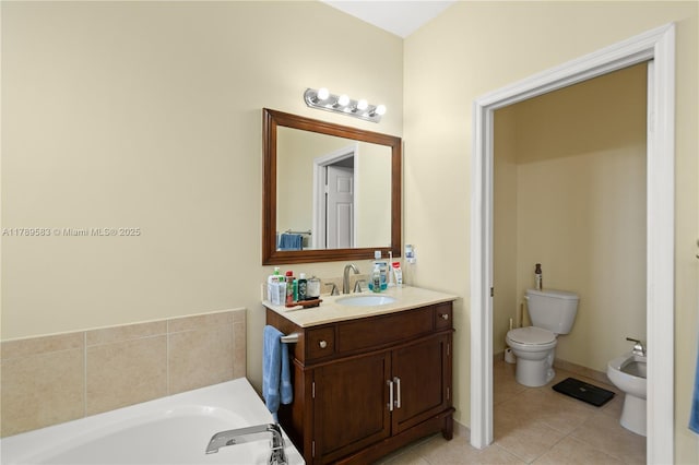 full bath featuring tile patterned floors, a garden tub, toilet, and vanity