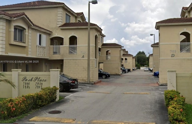 7985 NW 8th St Unit 110A, Miami, FL 33126 - view of asphalt road with street lights