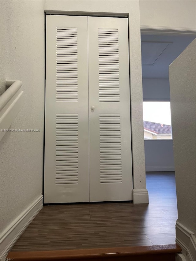 7985 NW 8th St Unit 110A, Miami, FL 33126 - detailed view of wood finished floors and baseboards