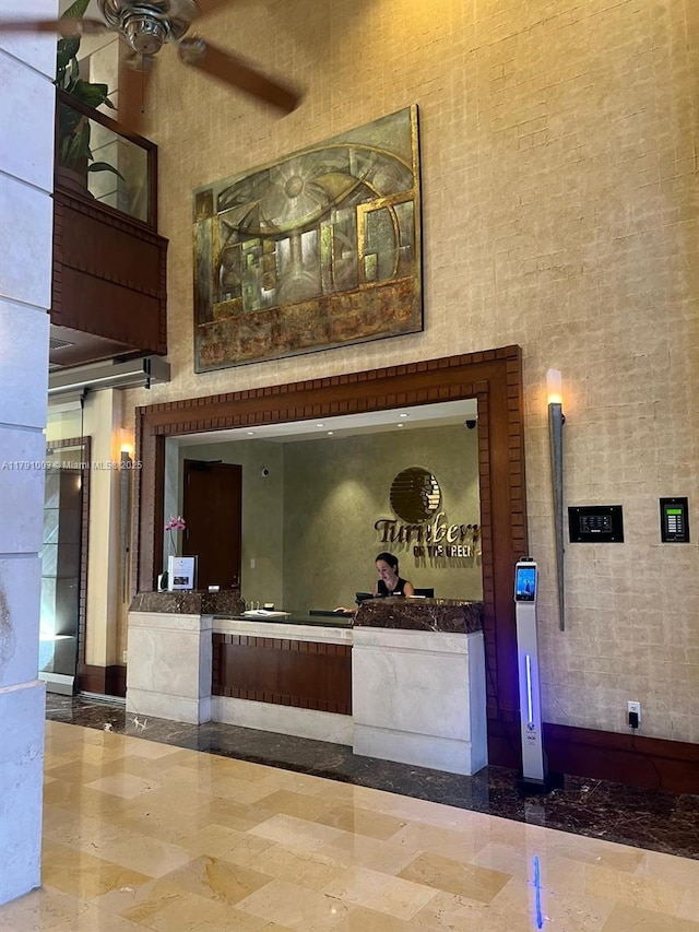 reception area featuring a ceiling fan