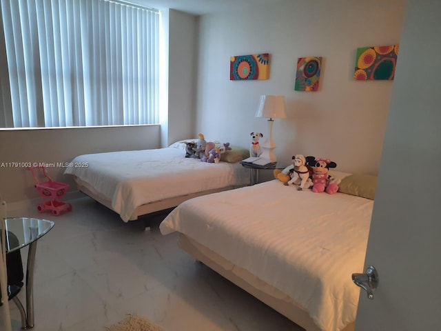 bedroom with marble finish floor