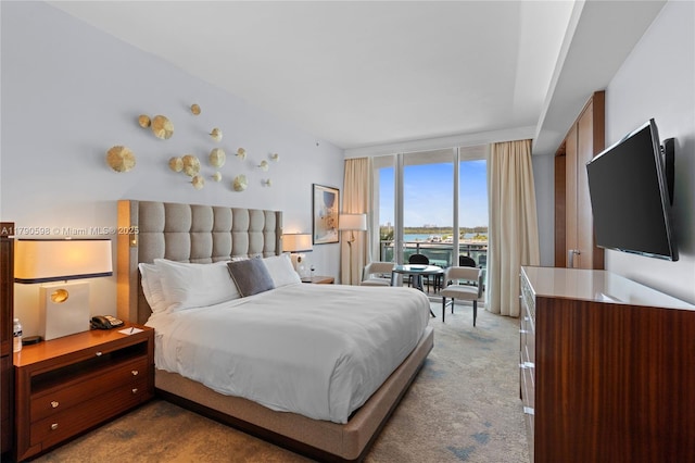10295 Collins Ave Unit 312, Bal Harbour, FL 33154 - bedroom featuring floor to ceiling windows, access to outside, and carpet floors