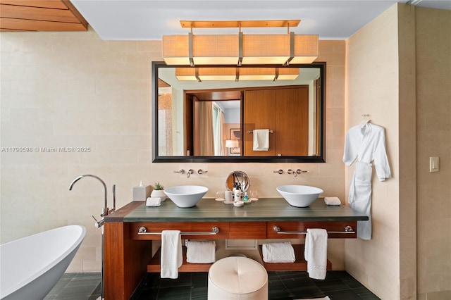 10295 Collins Ave Unit 312, Bal Harbour, FL 33154 - full bathroom featuring a soaking tub, double vanity, and a sink