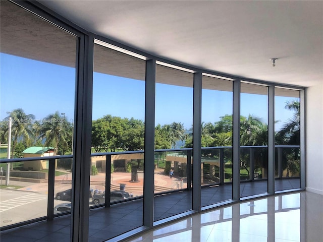 488 NE 18th St Unit 215, Miami, FL 33132 - doorway with expansive windows and plenty of natural light