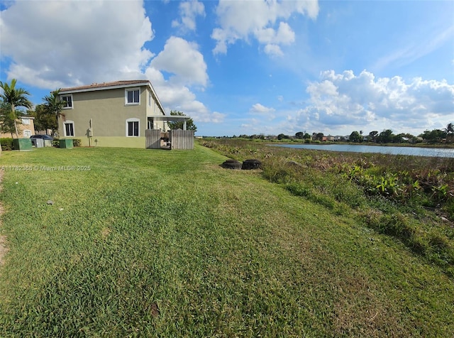 view of yard with a water view