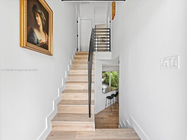 3025 SW 13th St, Miami, FL 33145 - staircase featuring wood finished floors and baseboards