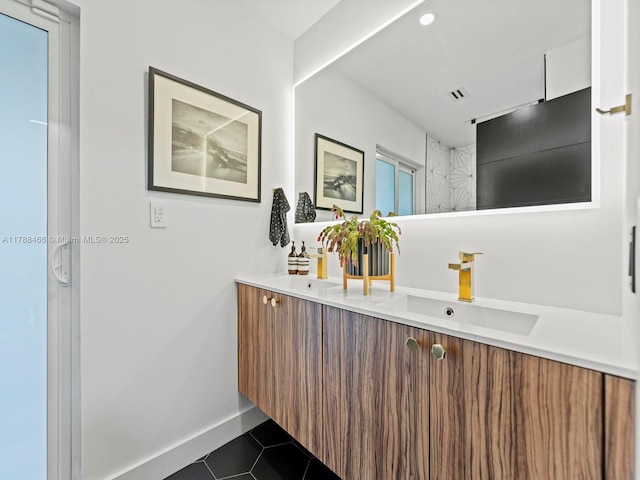 3025 SW 13th St, Miami, FL 33145 - full bath with double vanity and tile patterned flooring