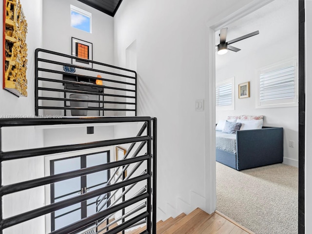 3025 SW 13th St, Miami, FL 33145 - staircase with ceiling fan, baseboards, and wood finished floors