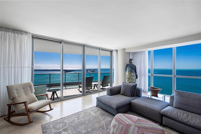 tiled living area with floor to ceiling windows and a water view