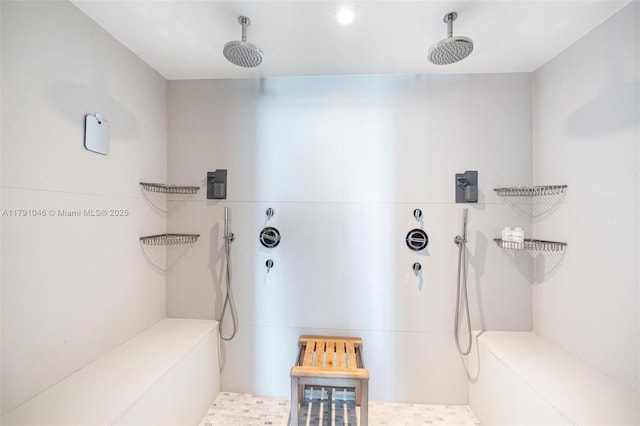 bathroom with tiled shower