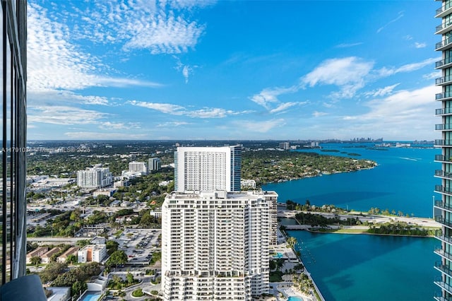 aerial view featuring a city view and a water view