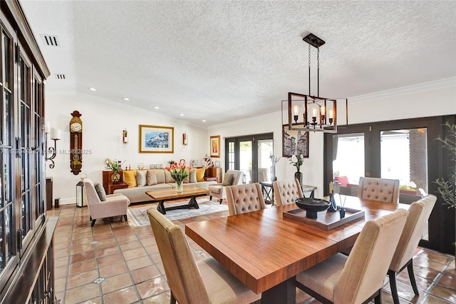 dining area with an inviting chandelier, light tile patterned flooring, french doors, and recessed lighting