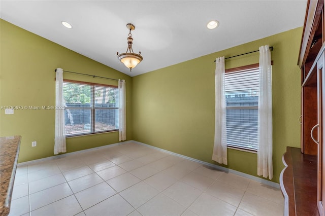 spare room featuring baseboards, recessed lighting, light tile patterned flooring, and lofted ceiling
