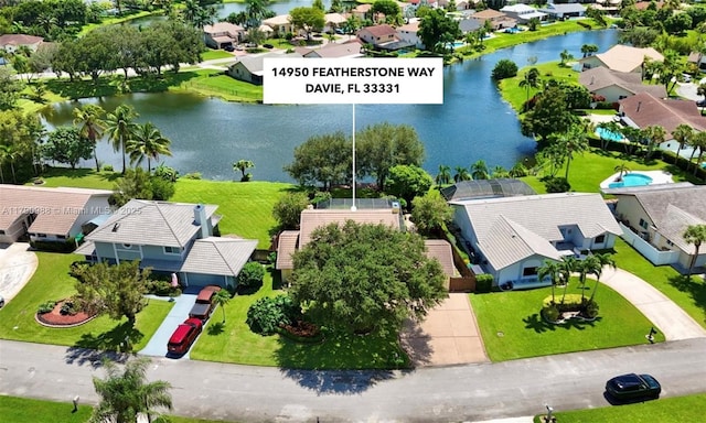 14950 Featherstone Way, Davie, FL 33331 - aerial perspective of suburban area featuring a nearby body of water