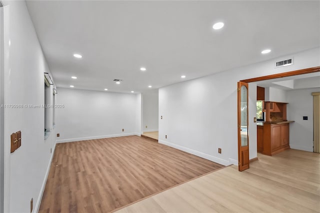 14950 Featherstone Way, Davie, FL 33331 - unfurnished room featuring light wood-type flooring, baseboards, and recessed lighting