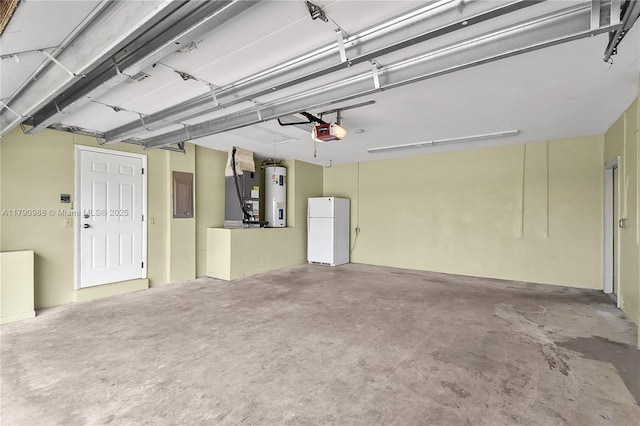 14950 Featherstone Way, Davie, FL 33331 - garage with freestanding refrigerator, electric water heater, a garage door opener, heating unit, and electric panel