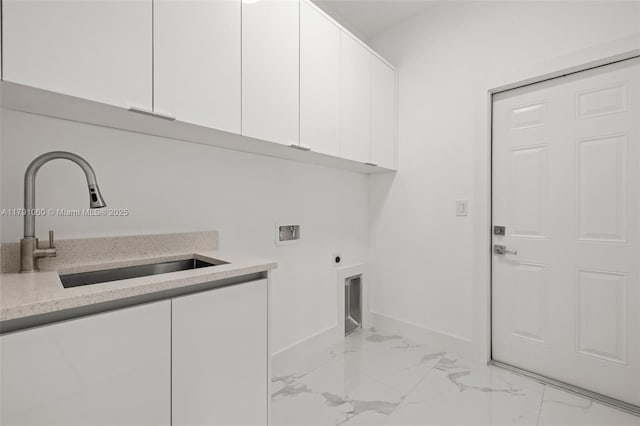 laundry area featuring hookup for an electric dryer, a sink, cabinet space, washer hookup, and marble finish floor