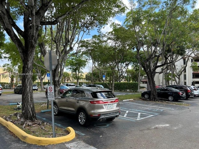9040 SW 125th Ave Unit D105, Miami, FL 33186 - view of uncovered parking lot