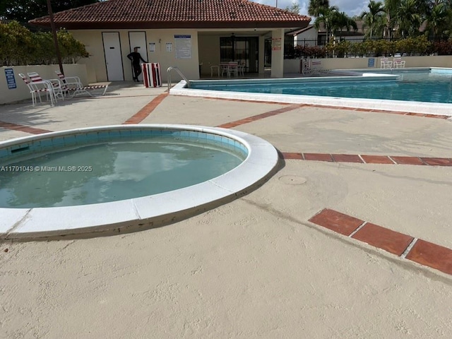 9040 SW 125th Ave Unit D105, Miami, FL 33186 - community pool with a patio