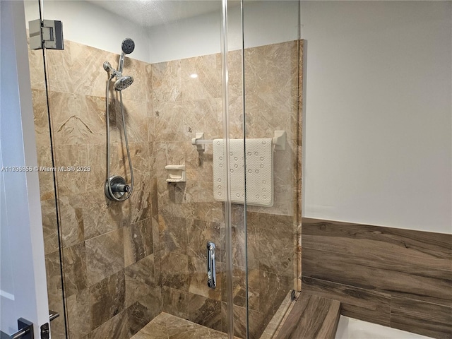 full bathroom with a stall shower