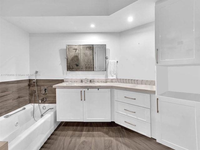 888 Brickell Key Dr Unit 2709, Miami, FL 33131 - bathroom featuring vanity, a washtub, recessed lighting, and a shower