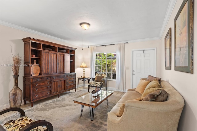living area featuring baseboards and ornamental molding
